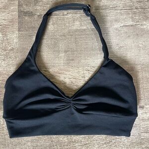 Bombshell Sportswear backless bra.  Size medium in black.